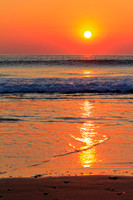 Orange sunrise reflection